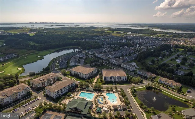 a front view of a building with a street