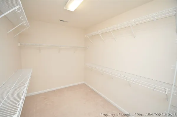 a view of small space with racks on the wall