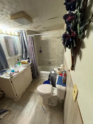 a bed room with furniture and a window