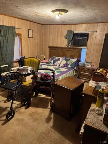 a play room with furniture and a chandelier