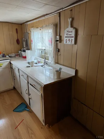 a view of a balcony with table and chairs