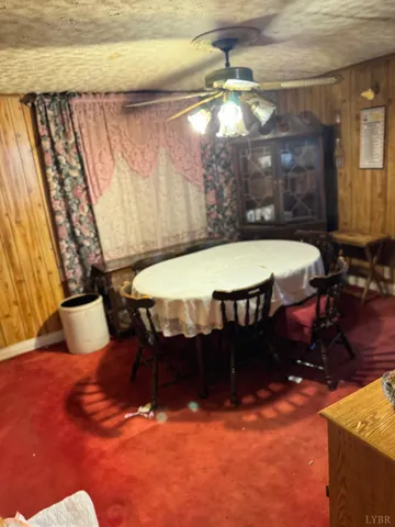 a room with furniture and a flat screen tv