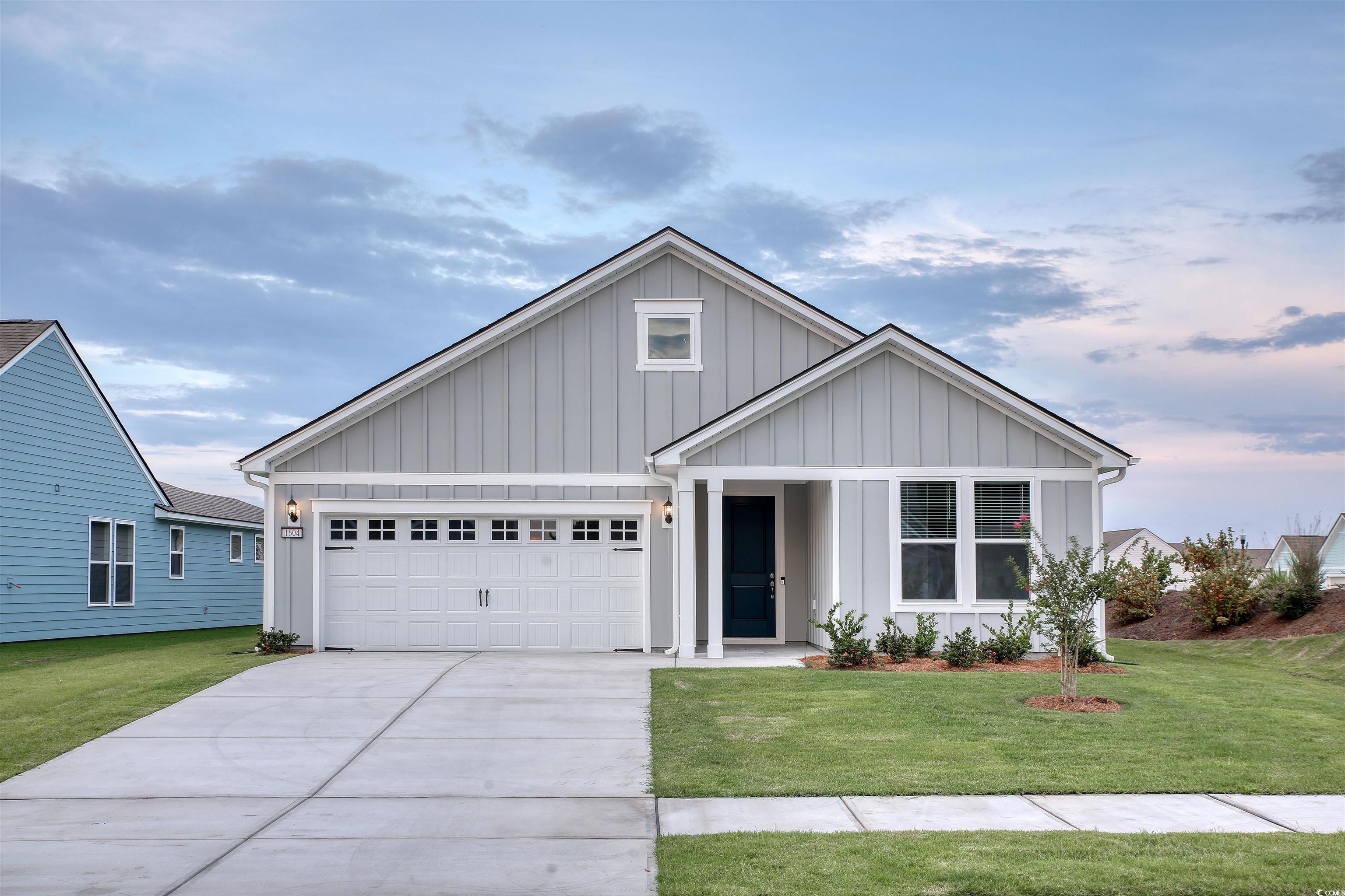 1604 Littleleaf Loop North Myrtle Beach, SC 29582 - Photo 1 of 40 View of front of property featuring a garage and a