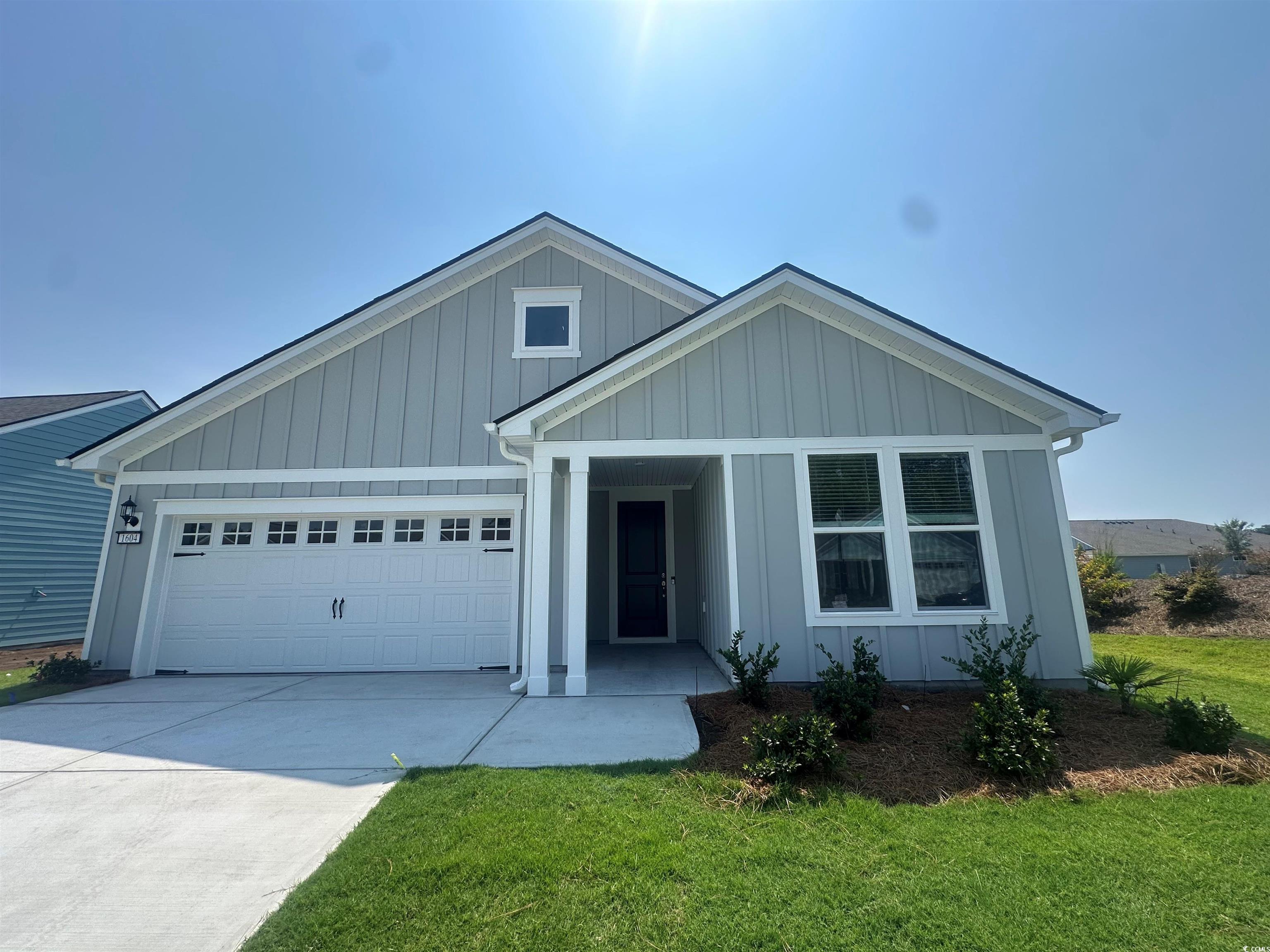 1604 Littleleaf Loop North Myrtle Beach, SC 29582 - Photo 2 of 40 View of front of home featuring a garage and a fro