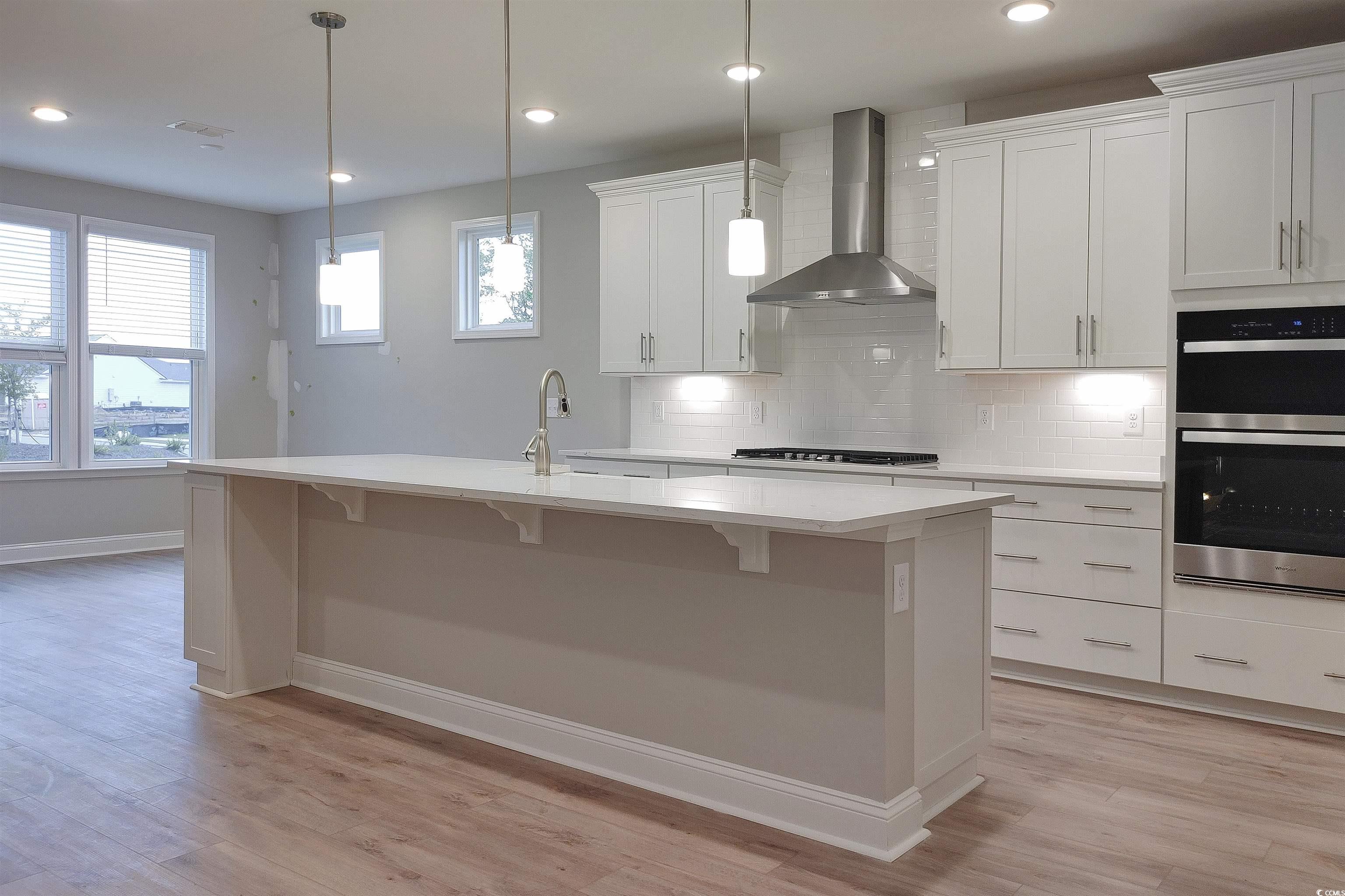1604 Littleleaf Loop North Myrtle Beach, SC 29582 - Photo 6 of 40 Kitchen featuring light hardwood / wood-style floo