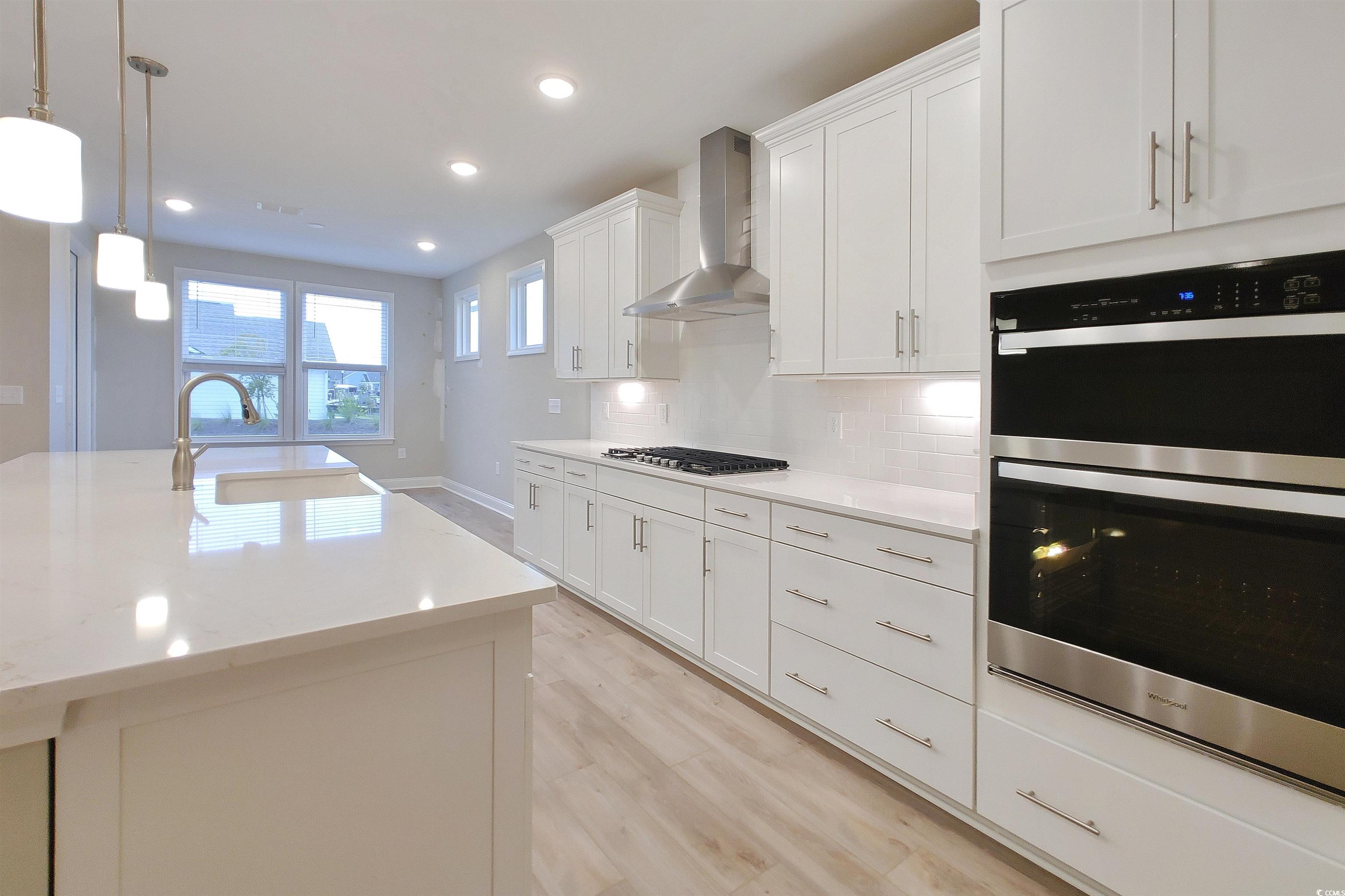 1604 Littleleaf Loop North Myrtle Beach, SC 29582 - Photo 8 of 40 Kitchen with light hardwood / wood-style flooring,