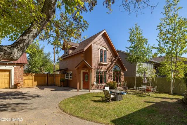 a bathroom with a sink toilet tub and shower