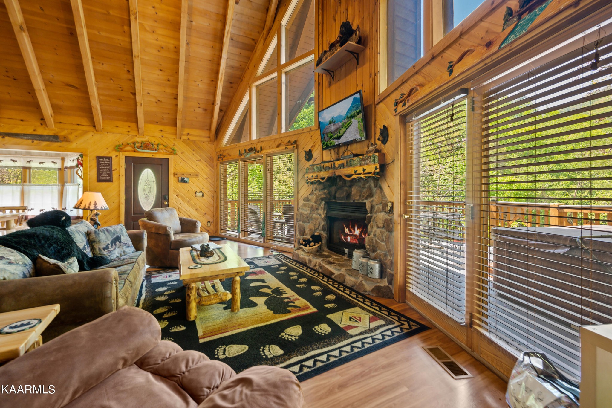 3138 North Clear Fork Road Sevierville, TN 37862 - Photo 16 of 35 a view of a patio with couches and a fireplace