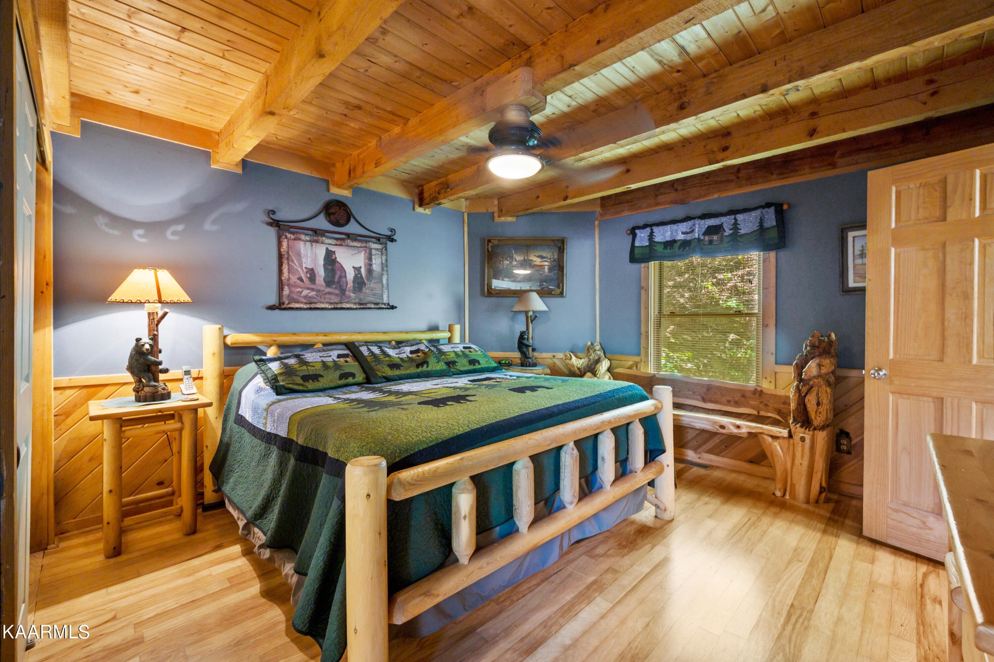 3138 North Clear Fork Road Sevierville, TN 37862 - Photo 19 of 35 a bedroom with furniture and a large window