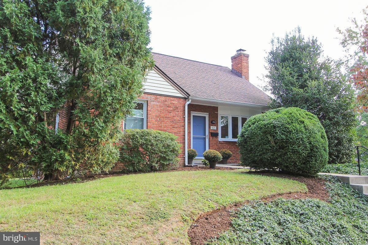 505 Kerwin Court Silver Spring, MD 20901 - Photo 2 of 27 a front view of a house with garden
