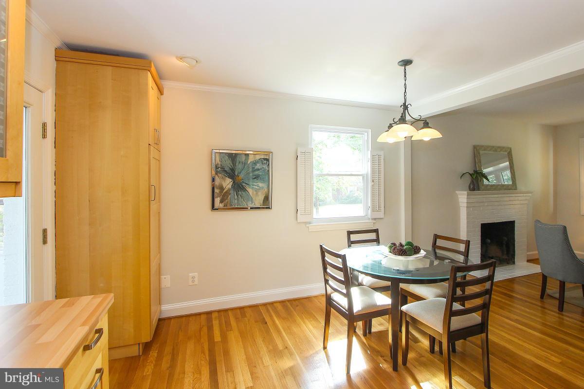 505 Kerwin Court Silver Spring, MD 20901 - Photo 13 of 27 a view of a dining room with furniture and a chandelier