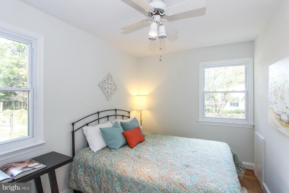 505 Kerwin Court Silver Spring, MD 20901 - Photo 15 of 27 a bedroom with a bed and a window