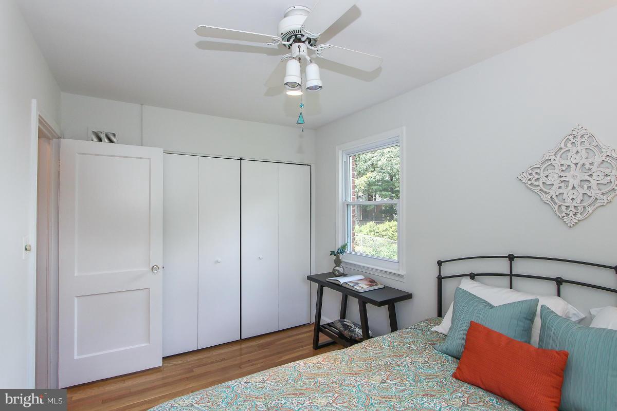 505 Kerwin Court Silver Spring, MD 20901 - Photo 16 of 27 a bedroom with furniture and a window
