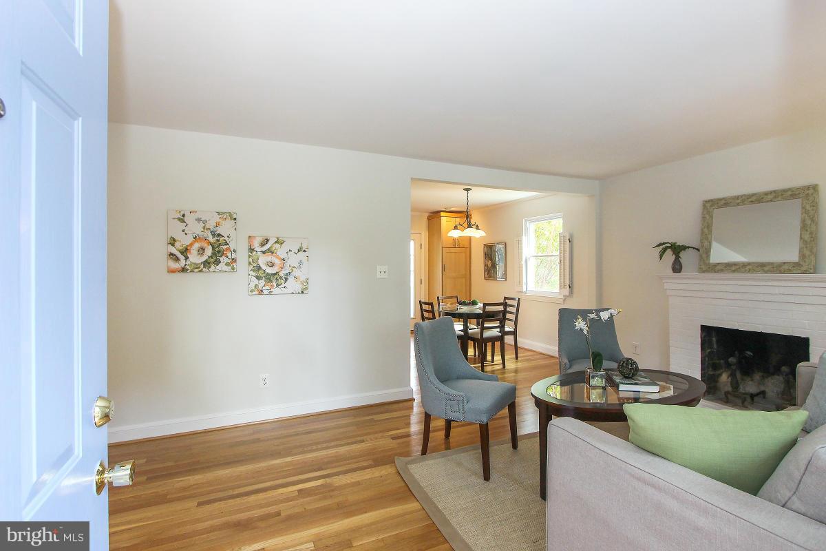505 Kerwin Court Silver Spring, MD 20901 - Photo 3 of 27 a living room with furniture and a fireplace