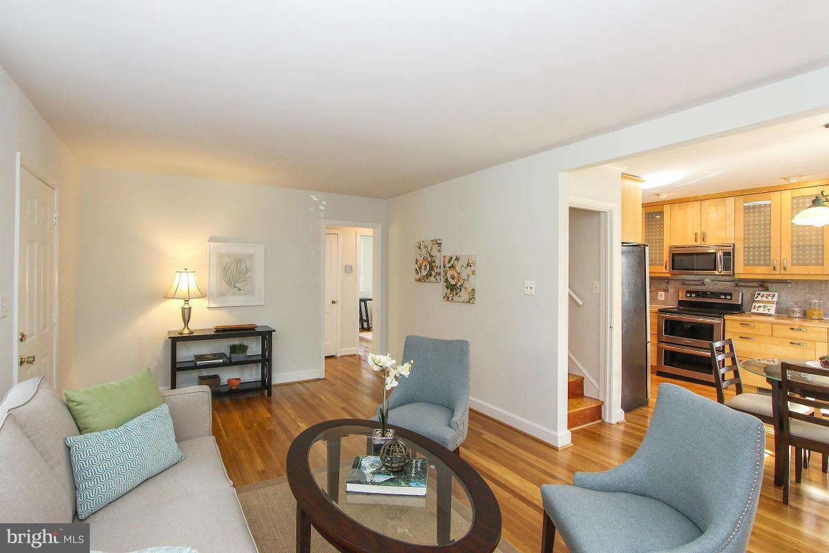 505 Kerwin Court Silver Spring, MD 20901 - Photo 7 of 27 a living room with furniture and wooden floor