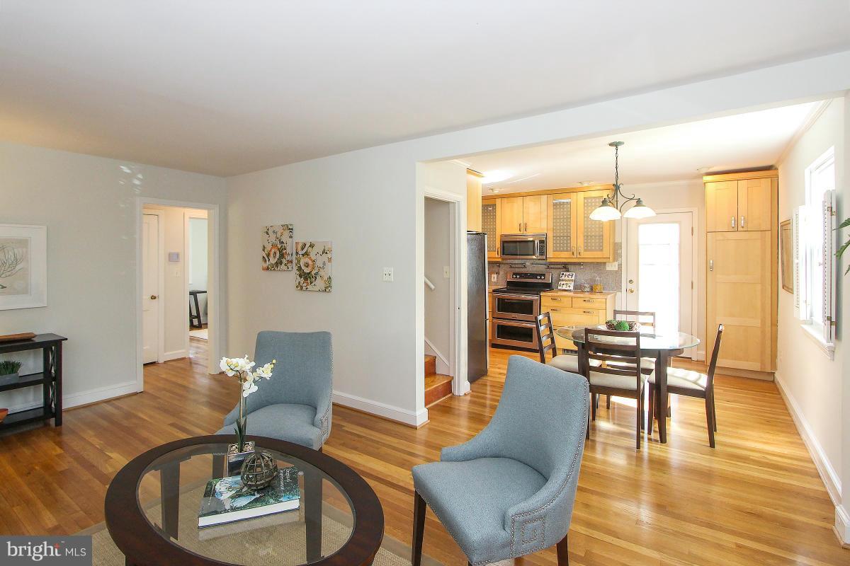 505 Kerwin Court Silver Spring, MD 20901 - Photo 8 of 27 a view of a dining room with furniture window and wooden floor