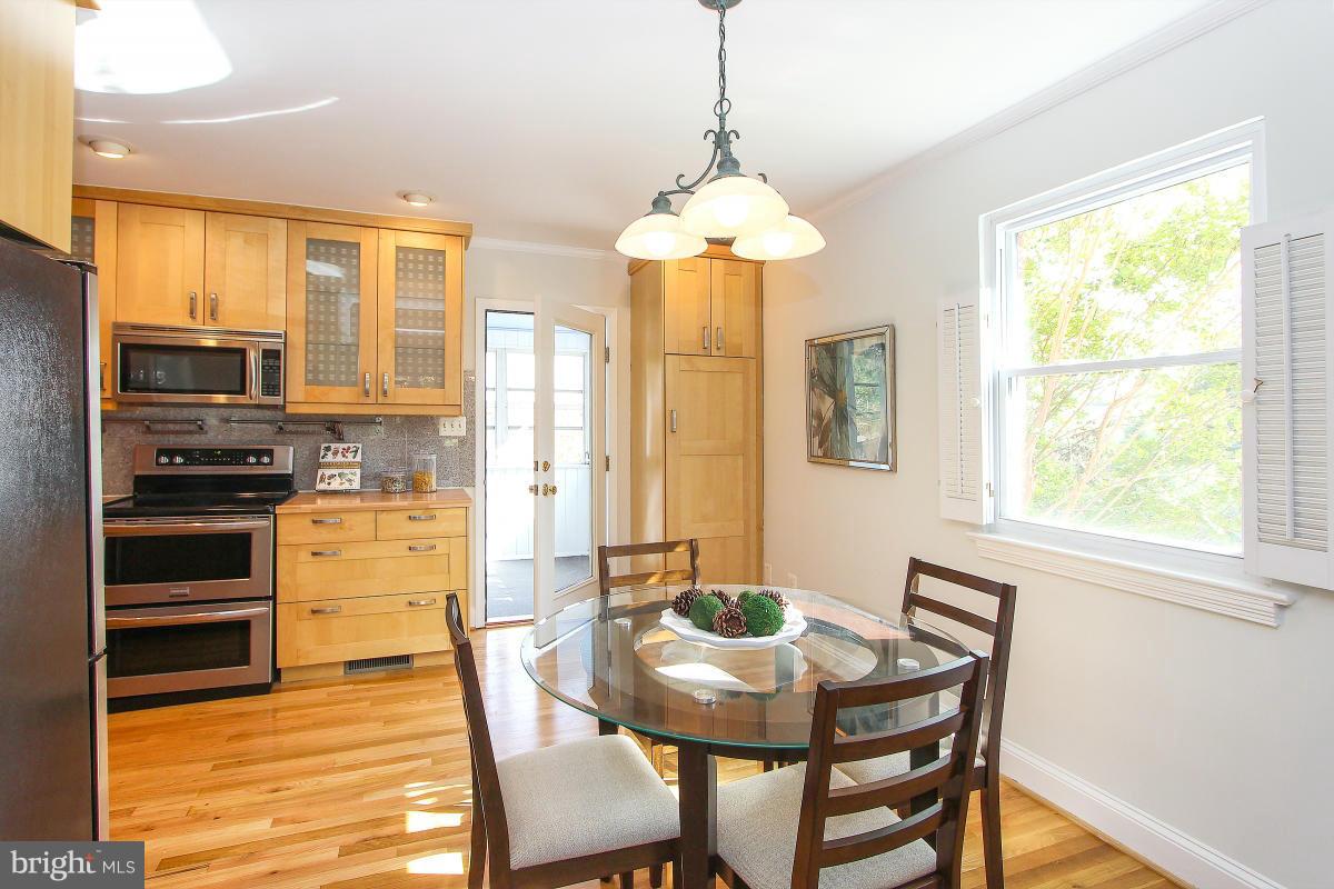 505 Kerwin Court Silver Spring, MD 20901 - Photo 9 of 27 a view of a dining room with furniture window and outside view