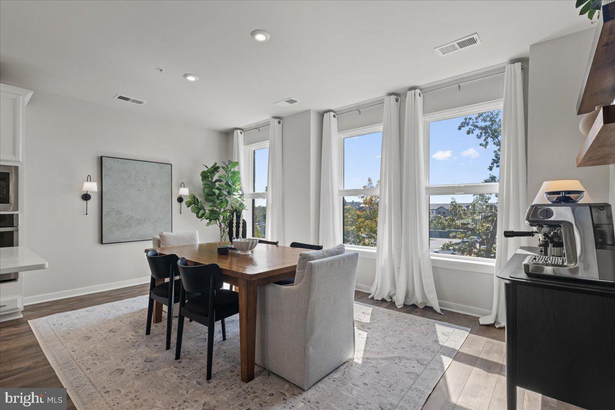 44614 Wolfhound Square Ashburn, VA 20147 - Photo 17 of 48 a dining room with furniture and window