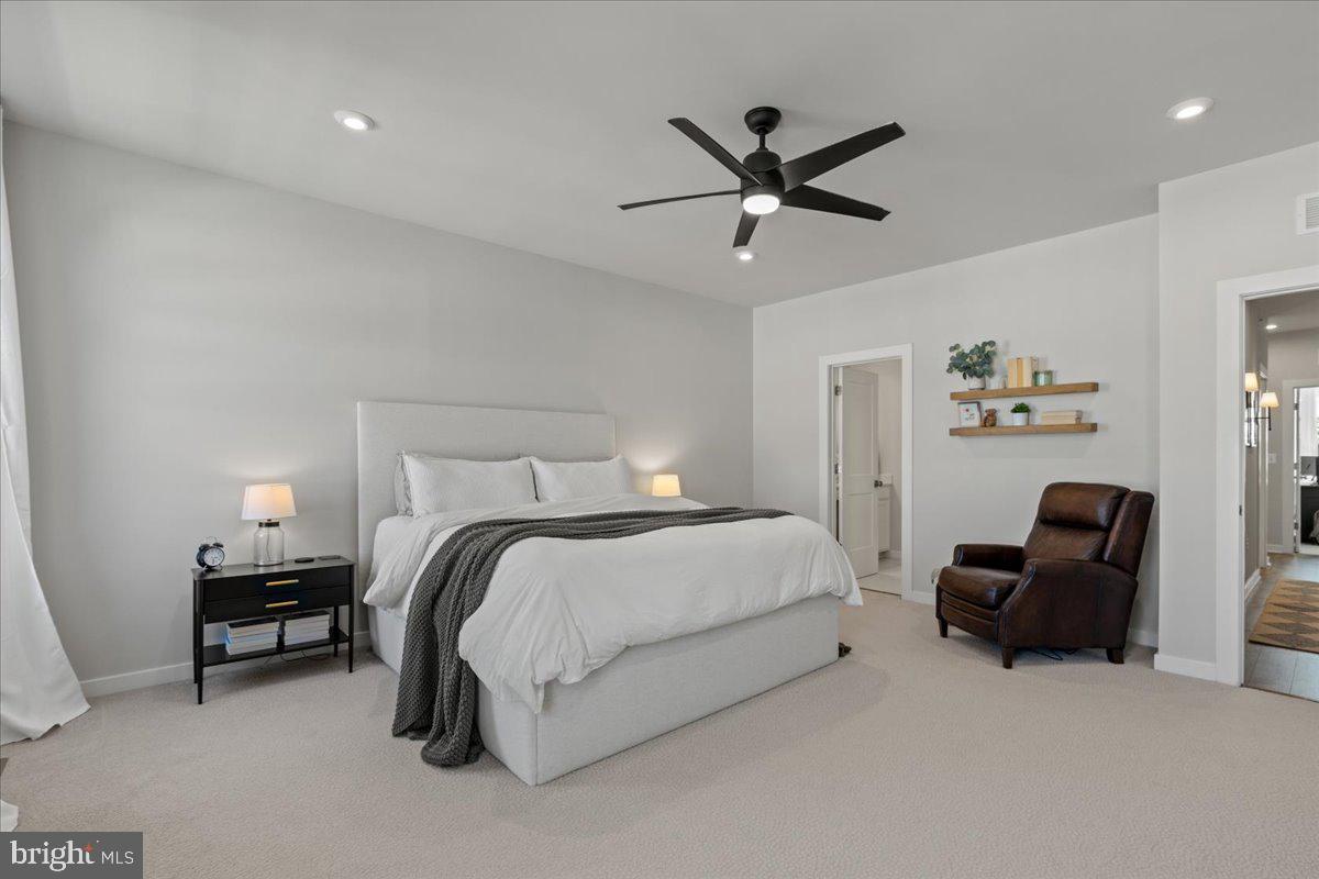 44614 Wolfhound Square Ashburn, VA 20147 - Photo 31 of 48 a bedroom with a bed and furniture
