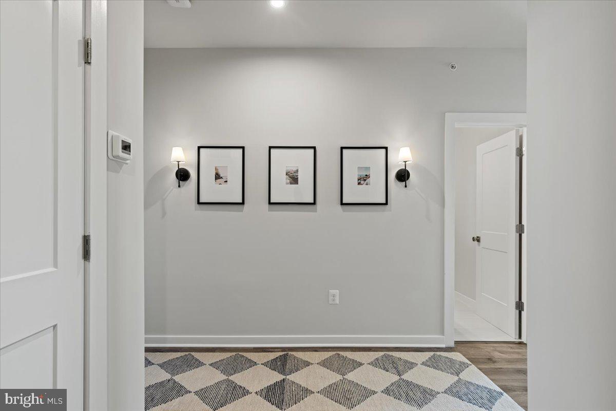 44614 Wolfhound Square Ashburn, VA 20147 - Photo 38 of 48 a view of a livingroom with wooden floor
