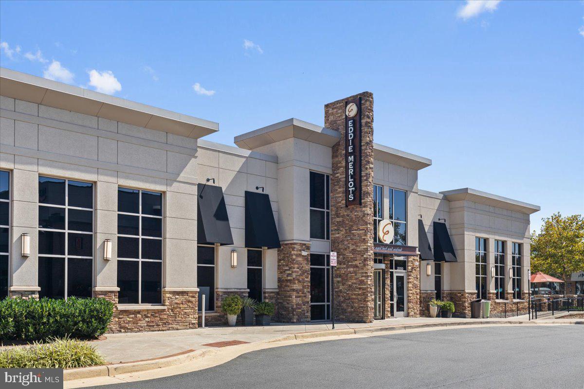 44614 Wolfhound Square Ashburn, VA 20147 - Photo 47 of 48 a city street lined with tall buildings