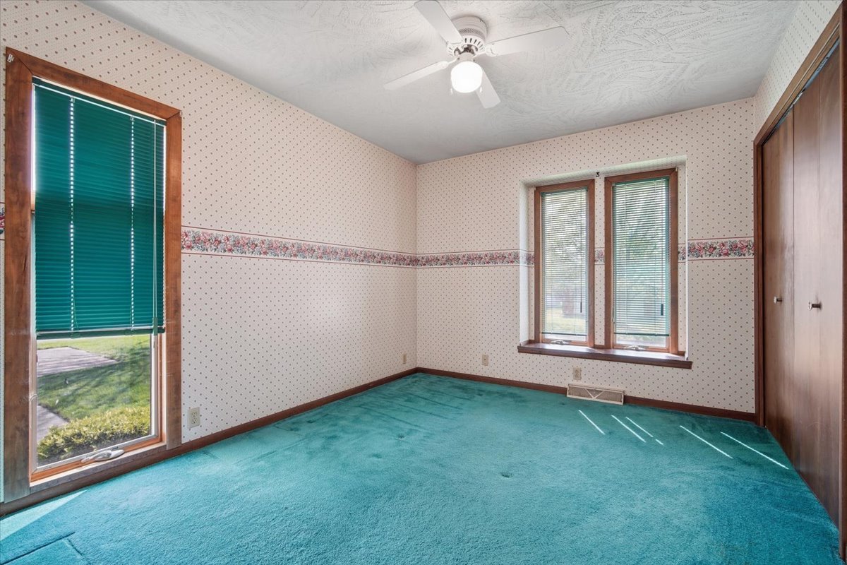 504 South School Street Minier, IL 61759 - Photo 26 of 46 wooden floor in an empty room with a window