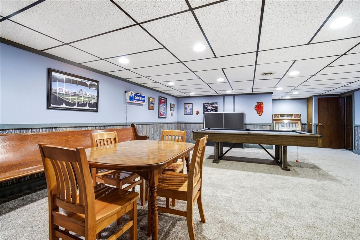 504 South School Street Minier, IL 61759 - Photo 31 of 46 a dining room with a wooden table and chairs
