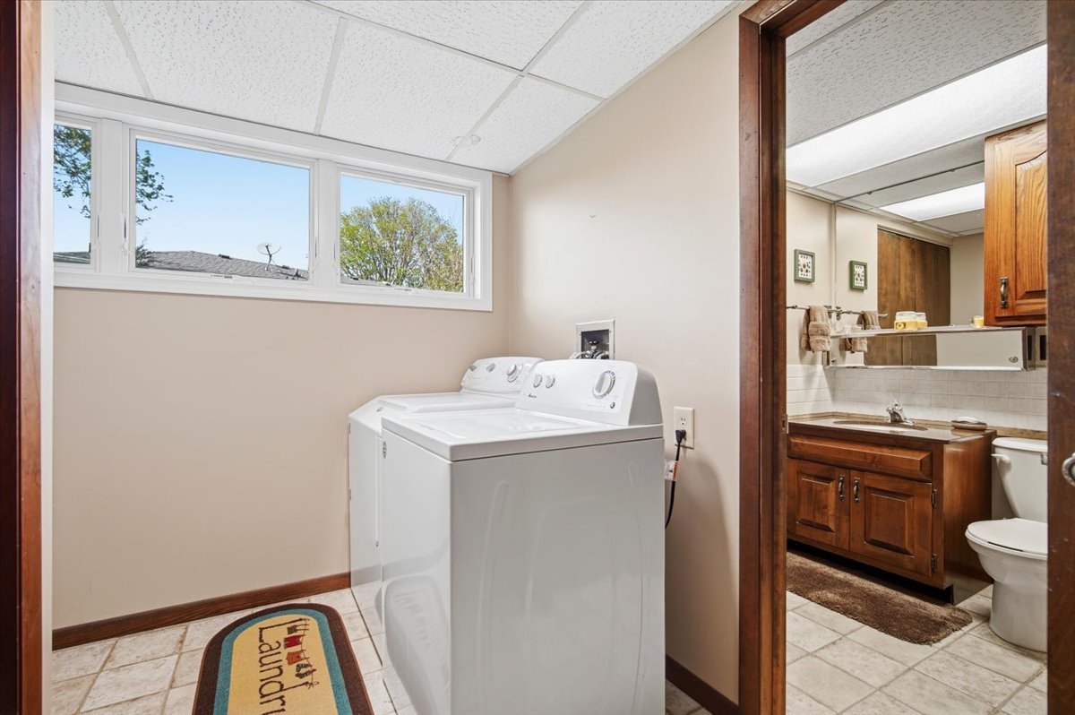 504 South School Street Minier, IL 61759 - Photo 33 of 46 a utility room with dryer and washer