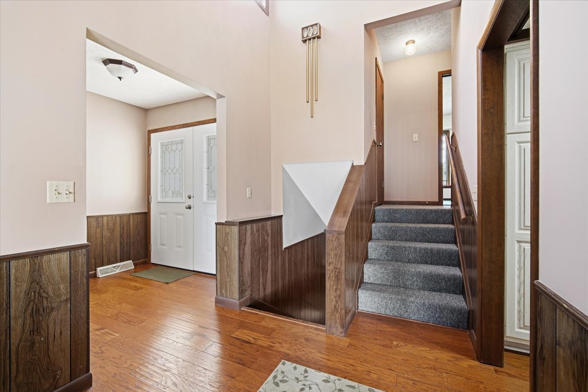 504 South School Street Minier, IL 61759 - Photo 5 of 46 a view of entryway and hall with wooden floor