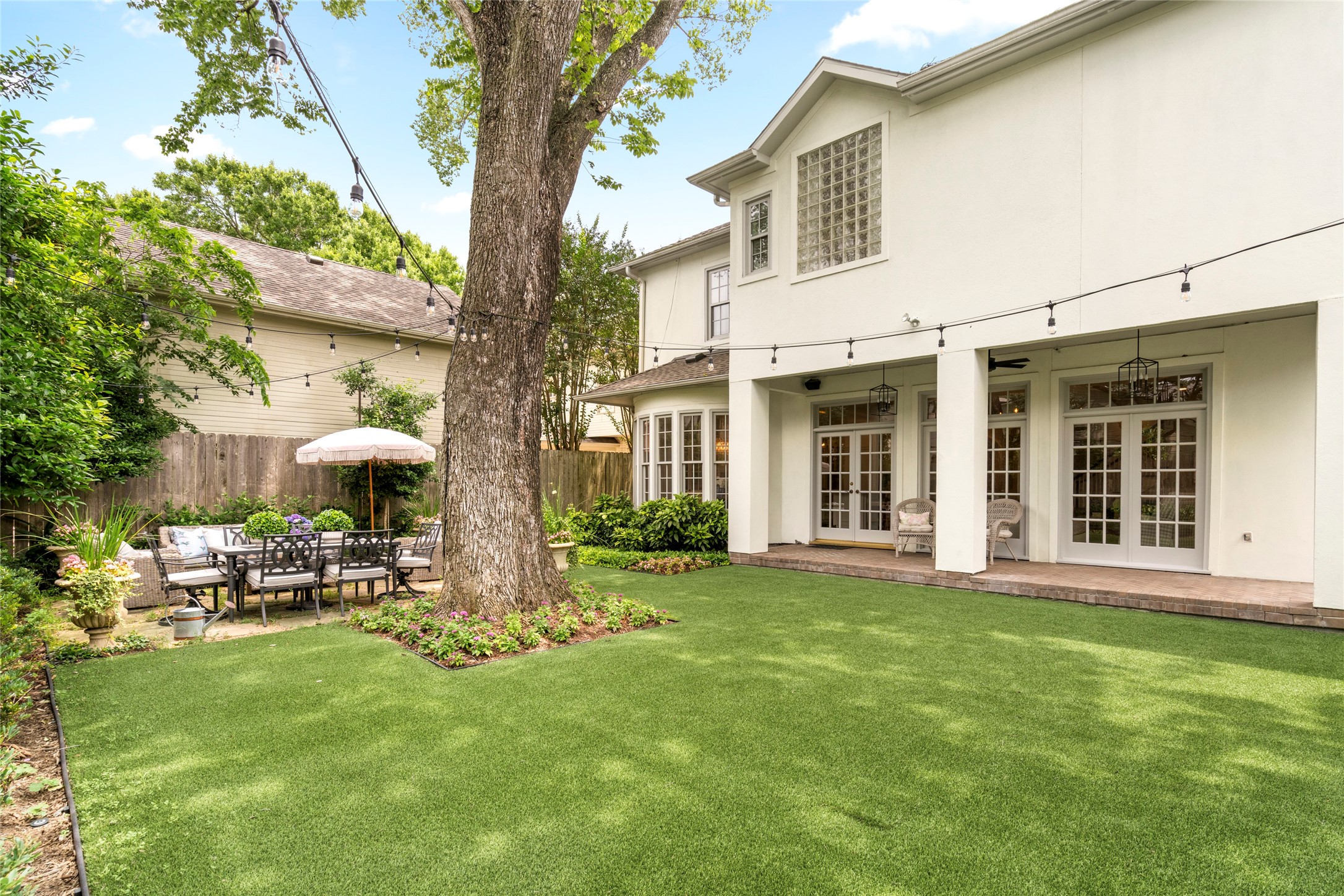 4220 Riley Street West University Place, TX 77005 - Photo 33 of 35 This is one of the prettiest backyards in West University Place! English garden inspired landscaping, pet-friendly turf, and much more!