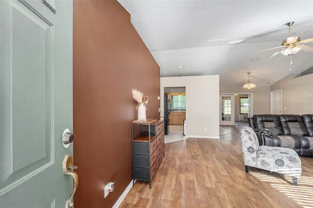 a view of a living room and dining room