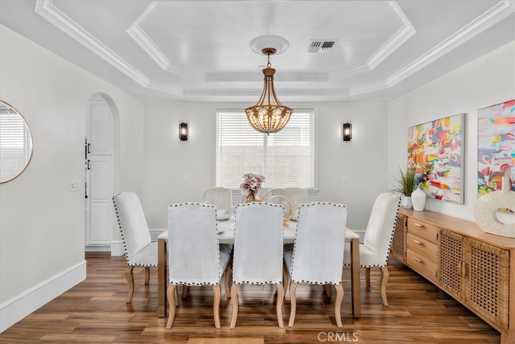 1035 Avenue D Redondo Beach, CA 90277 - Photo 15 of 66 a view of a dining room with furniture wooden floor and a chandelier