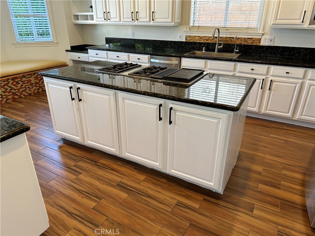 1035 Avenue D Redondo Beach, CA 90277 - Photo 25 of 66 a kitchen with granite countertop a sink and a stove