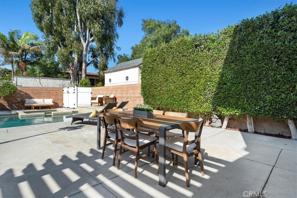 1035 Avenue D Redondo Beach, CA 90277 - Photo 36 of 66 a view of a patio with table and chairs and potted plants