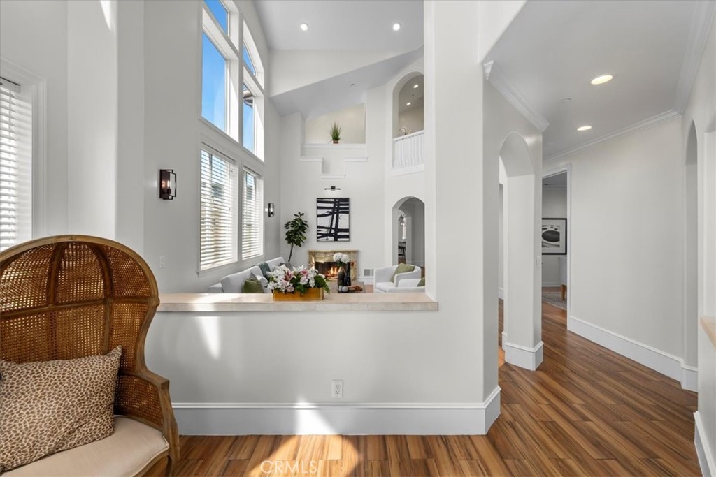 1035 Avenue D Redondo Beach, CA 90277 - Photo 4 of 66 a view of living room with kitchen island stainless steel appliances and wooden floor