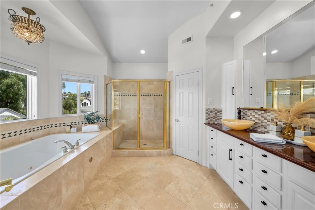 1035 Avenue D Redondo Beach, CA 90277 - Photo 45 of 66 a large spacious bathroom with a tub a double vanity sink a mirror and a shower