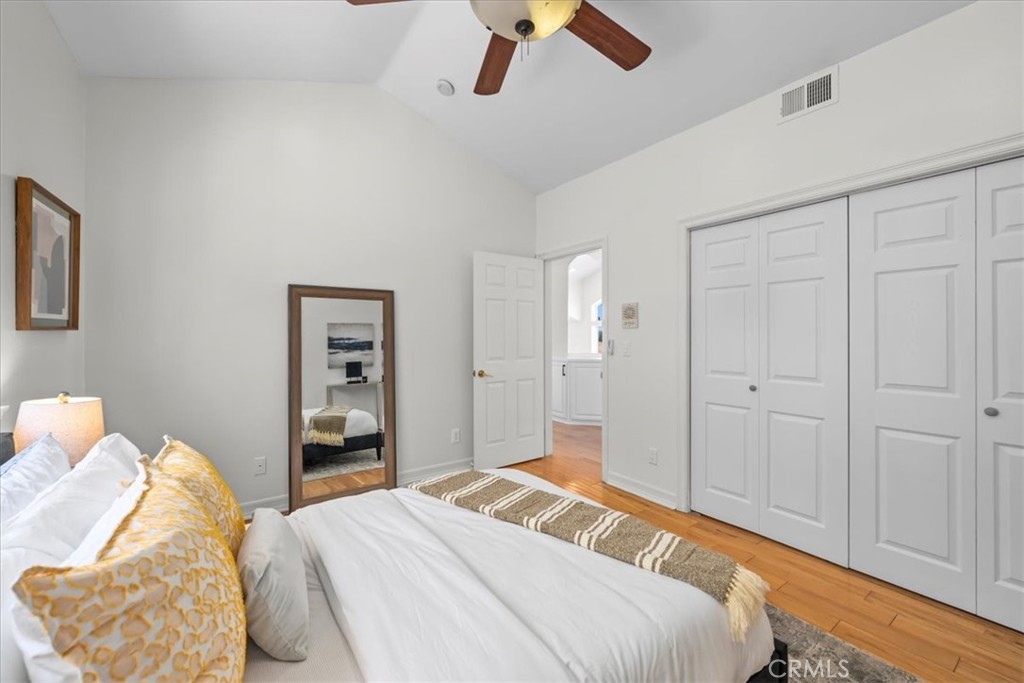 1035 Avenue D Redondo Beach, CA 90277 - Photo 50 of 66 a bedroom with a bed and a chandelier