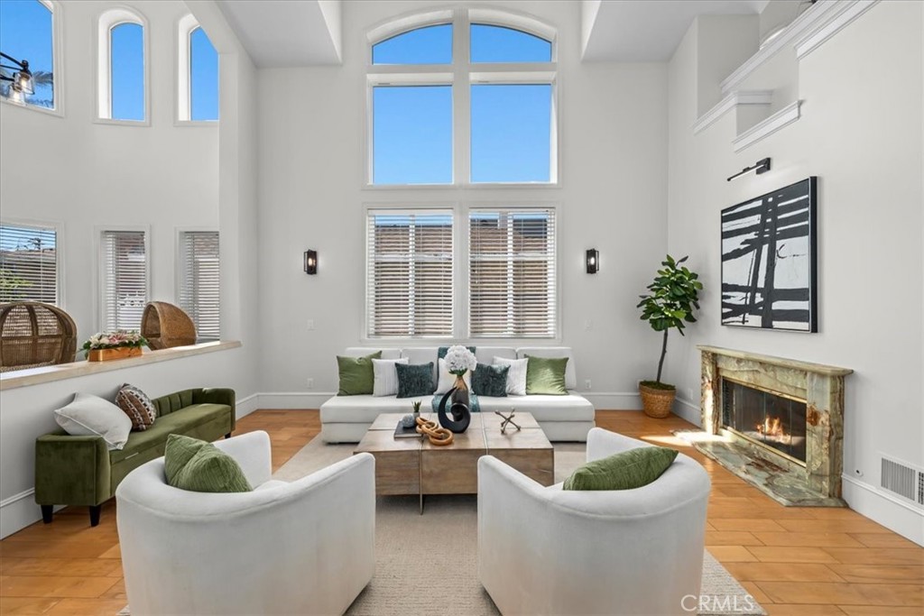 1035 Avenue D Redondo Beach, CA 90277 - Photo 6 of 66 a living room with furniture a fireplace and a potted plant