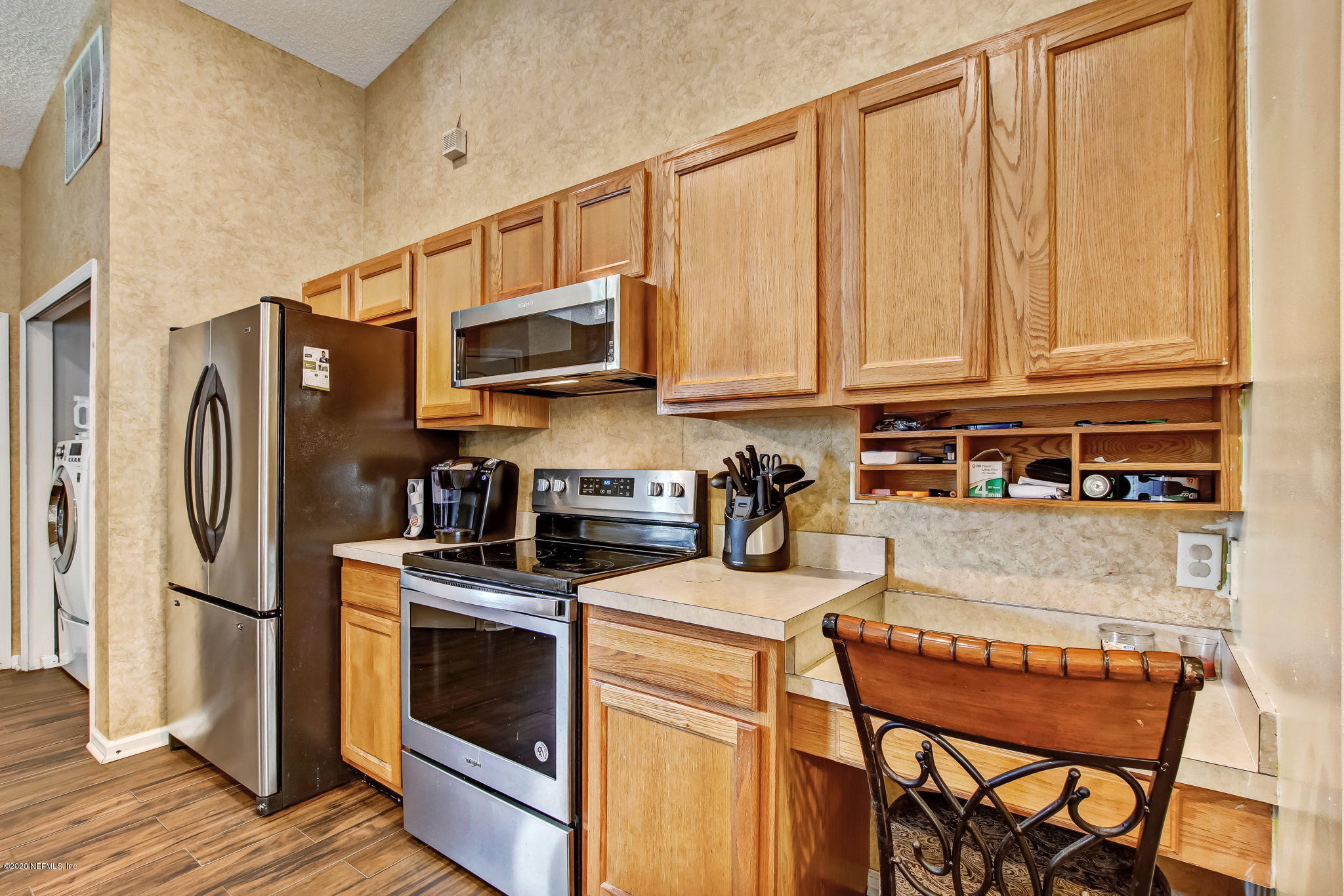 2499 Paris Mill Road Jacksonville, FL 32221 - Photo 25 of 60 a kitchen with stainless steel appliances granite countertop a refrigerator a stove top oven a sink and dishwasher
