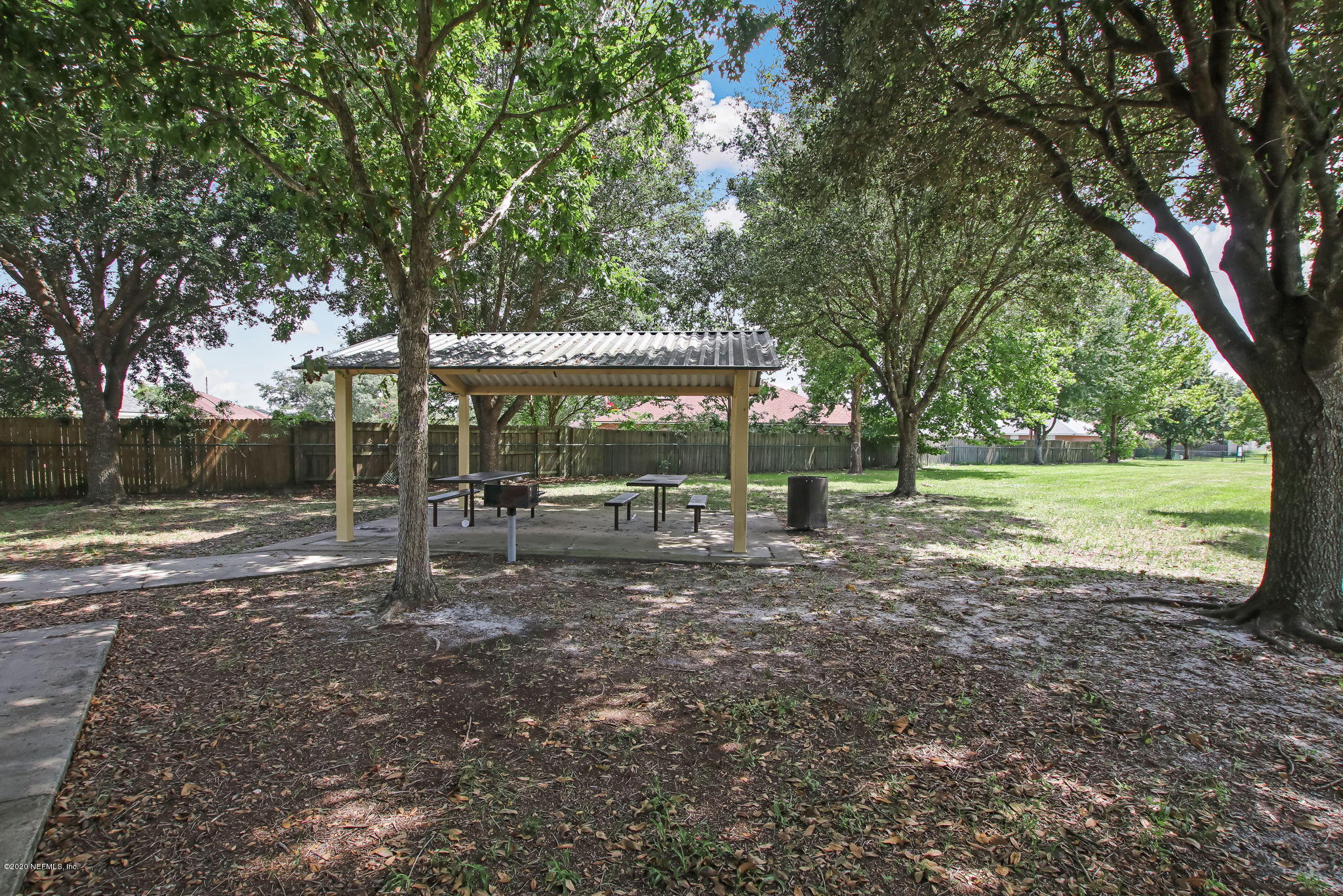2499 Paris Mill Road Jacksonville, FL 32221 - Photo 53 of 60 a view of a house with backyard and sitting area