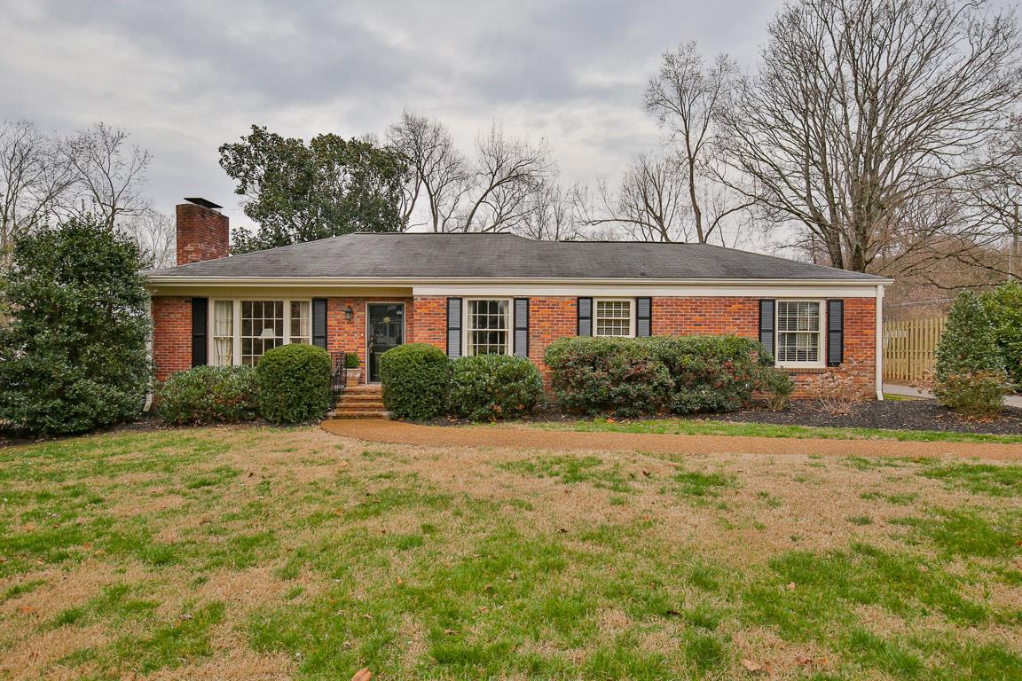 143 Alton Road Nashville, TN 37205 - Photo 1 of 25 a front view of a house with a yard