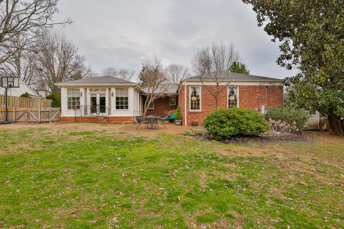 143 Alton Road Nashville, TN 37205 - Photo 25 of 25 a front view of a house with a yard