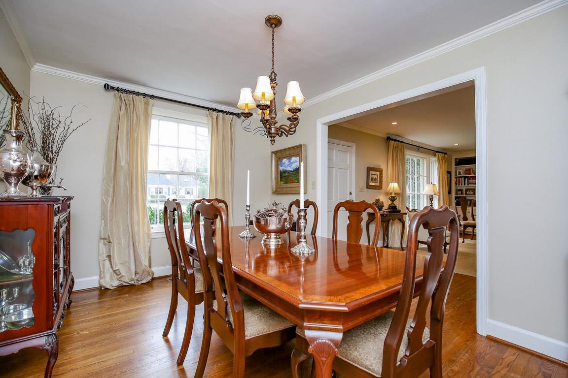 143 Alton Road Nashville, TN 37205 - Photo 4 of 25 a dining room with furniture a chandelier and wooden floor