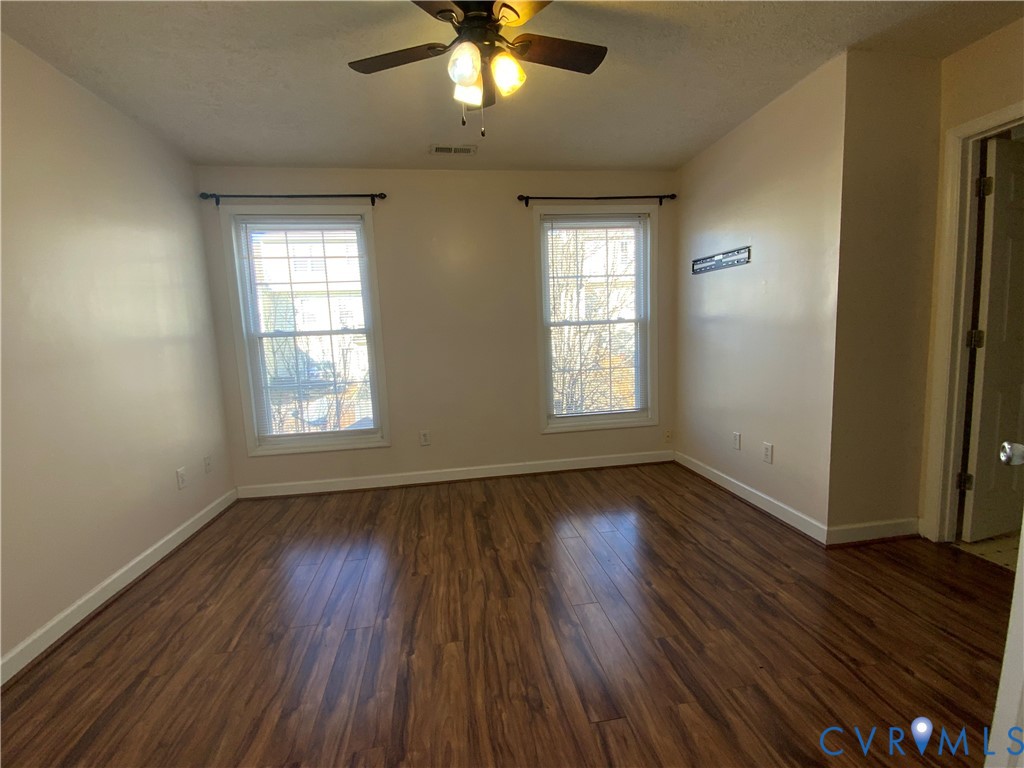 2708 Goyne Loop Chester, VA 23831 - Photo 11 of 17 Spare room with dark wood finished floors, a ceili