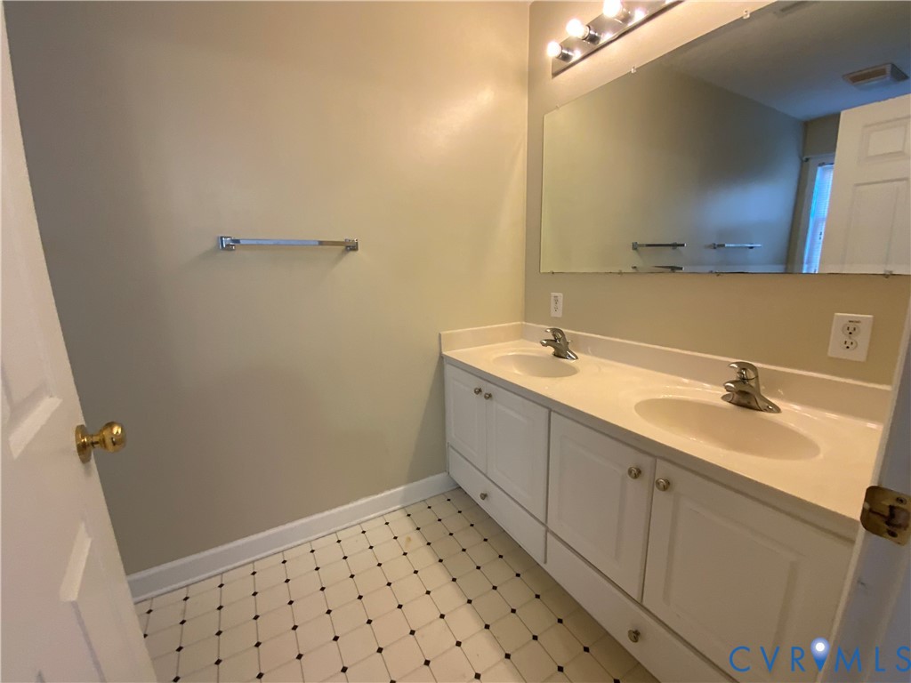 2708 Goyne Loop Chester, VA 23831 - Photo 14 of 17 Full bath featuring double vanity and light floori
