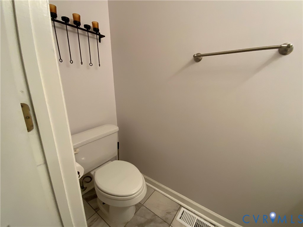 2708 Goyne Loop Chester, VA 23831 - Photo 6 of 17 Bathroom with toilet and tile patterned flooring