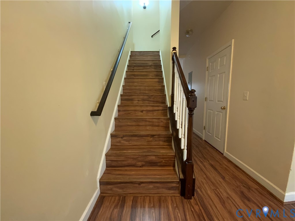 2708 Goyne Loop Chester, VA 23831 - Photo 9 of 17 Staircase featuring wood finished floors and baseb