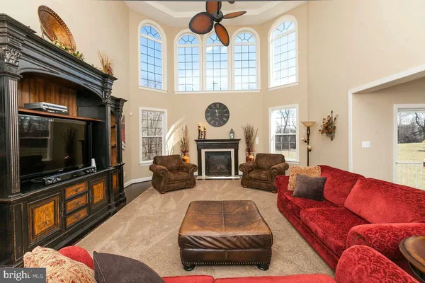 a view of a dining room with furniture and window
