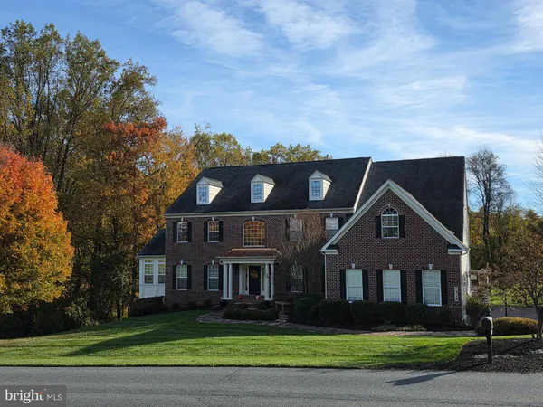 front view of house with a yard