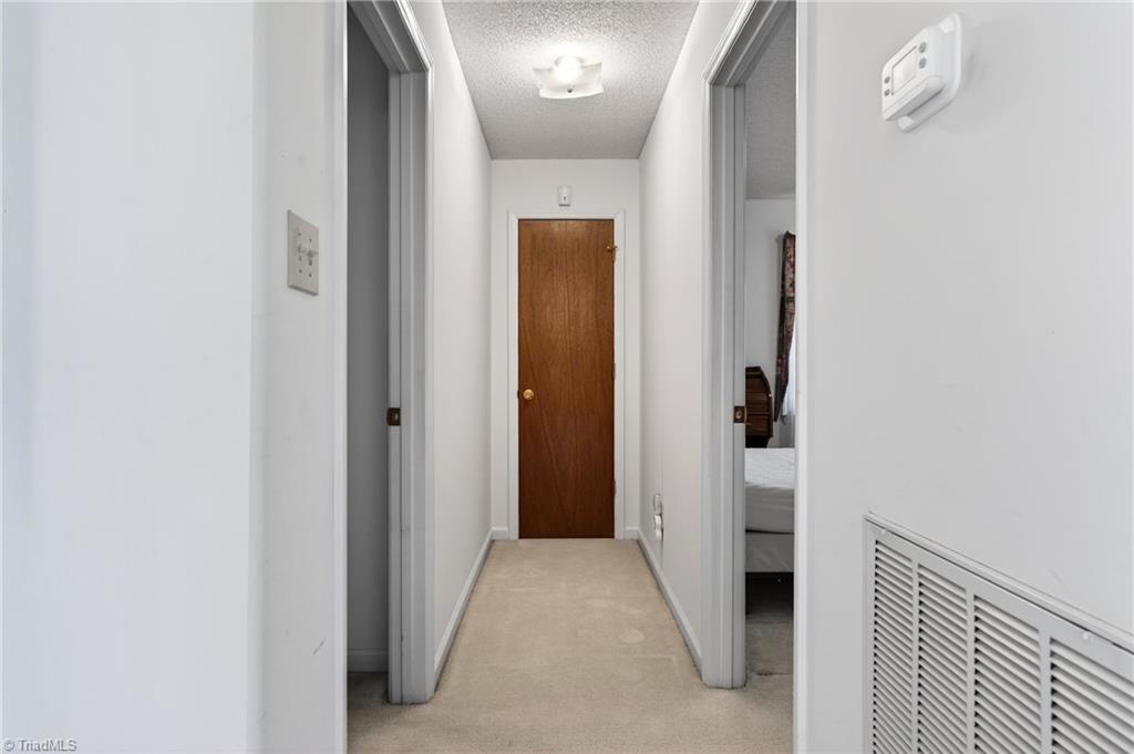 482 Bethany Road Reidsville, NC 27320 - Photo 23 of 49 hallway to bedrooms